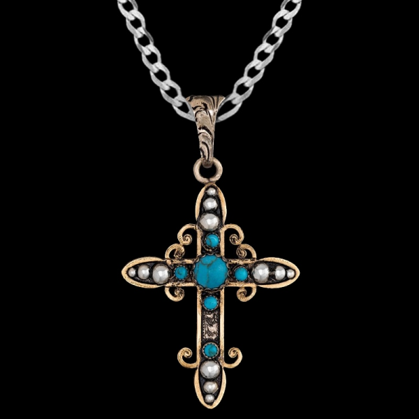 Our Joshua Cross Pendant Necklace features a german silver base embellished with intrincate silver beads and turquoise stones, framed with bronze scrolls. Pair it with a special discount sterling silver chain today!